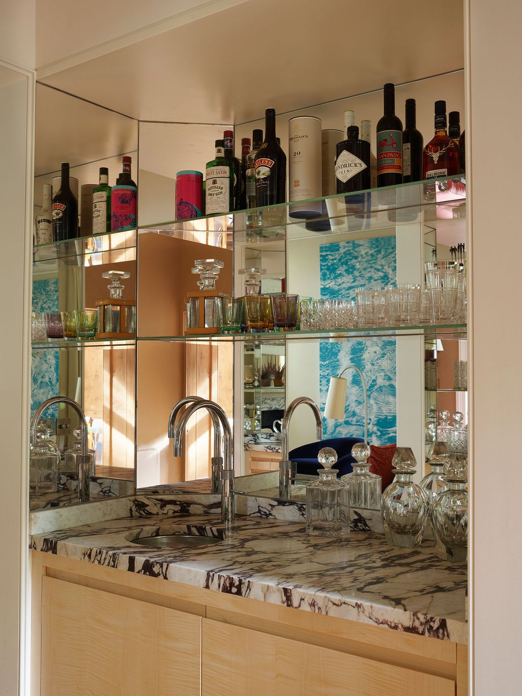 Image may contain Shelf Sink Faucet and Indoors