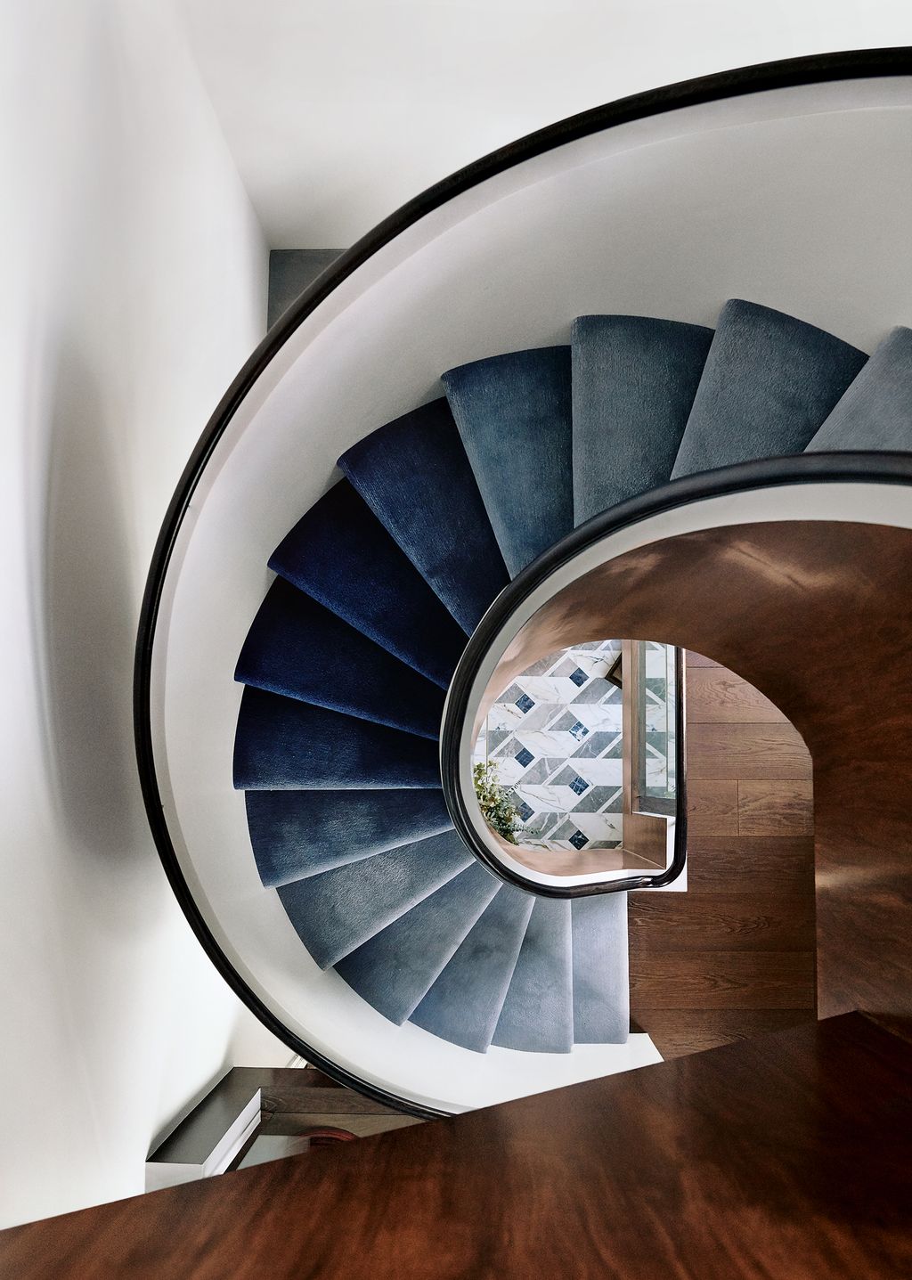 Image may contain Banister Handrail and Staircase