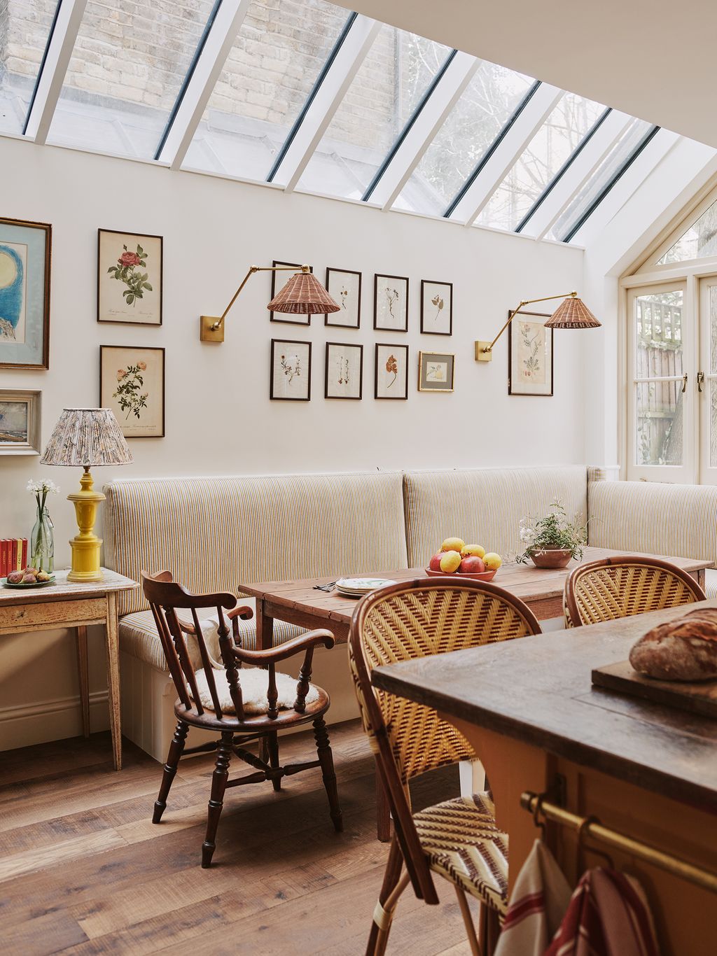 Image may contain Furniture Chair Restaurant Table Wood Interior Design Indoors Dining Table and Room