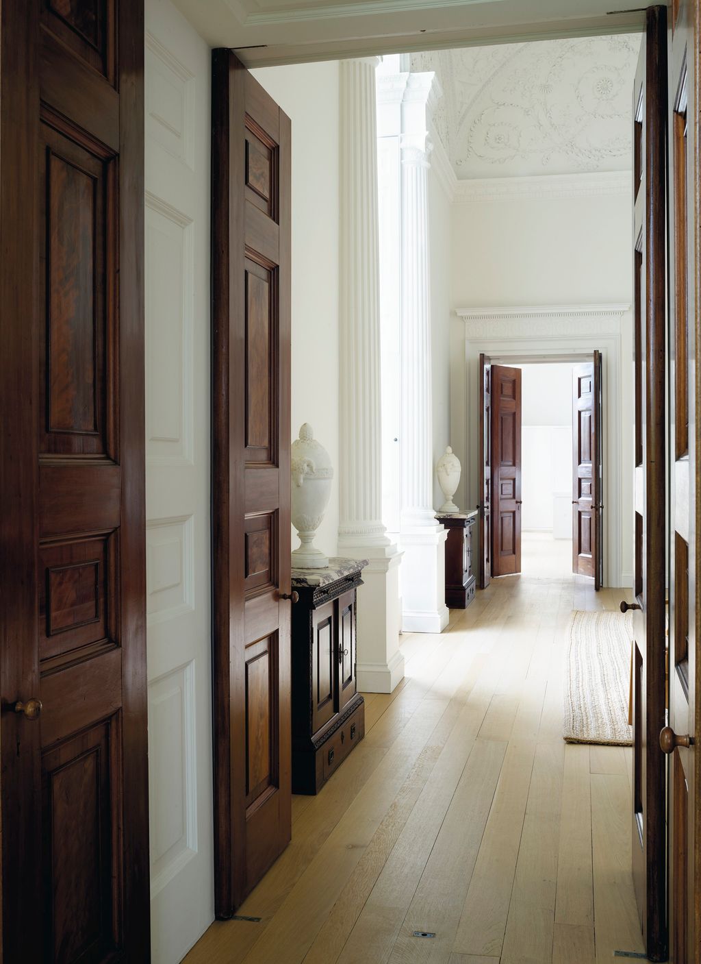 Image may contain Floor Flooring Wood Corridor and Hardwood