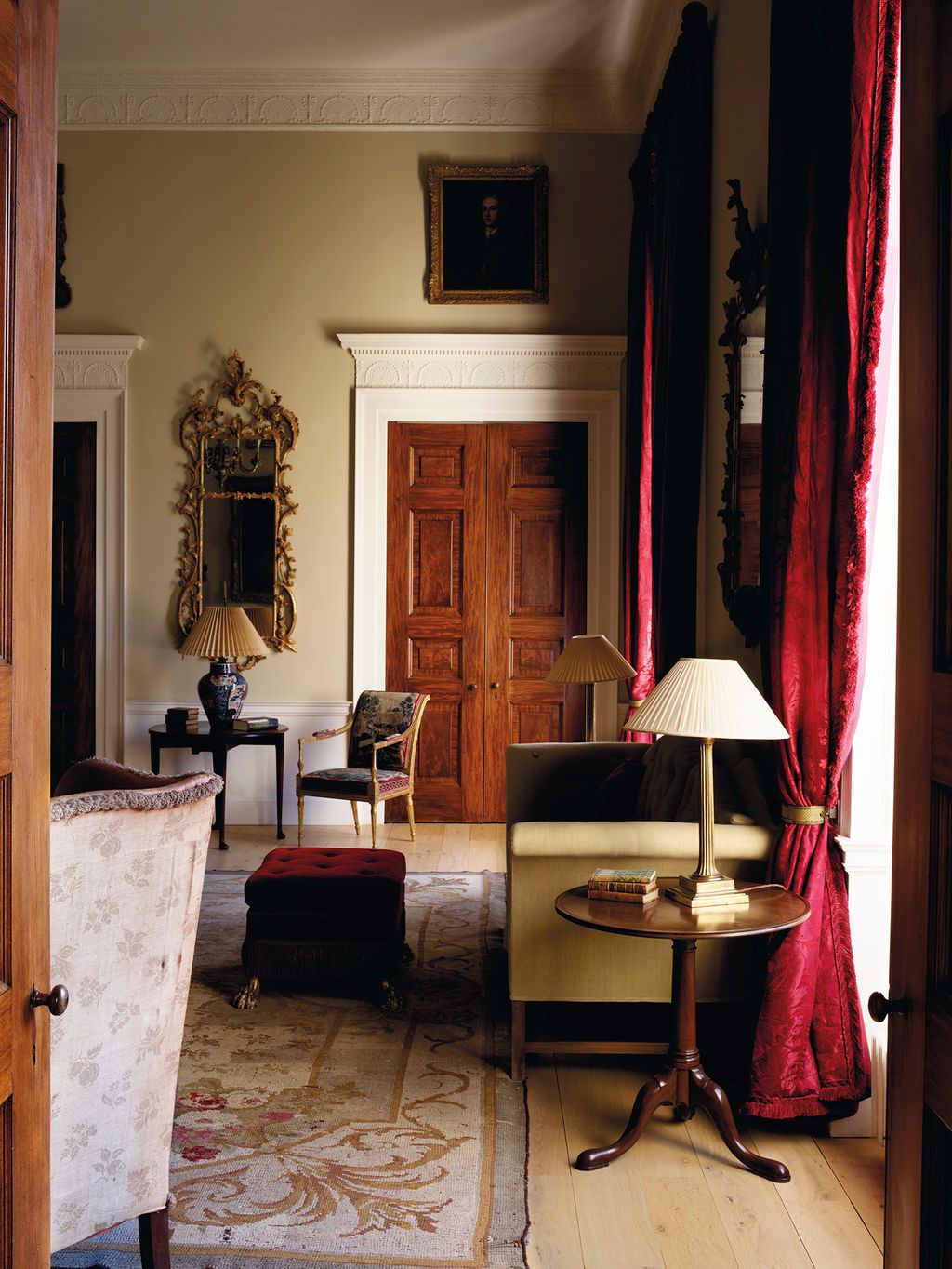 Image may contain Living Room Room Indoors Flooring Furniture Wood Lamp Table Lamp Hardwood and Interior Design