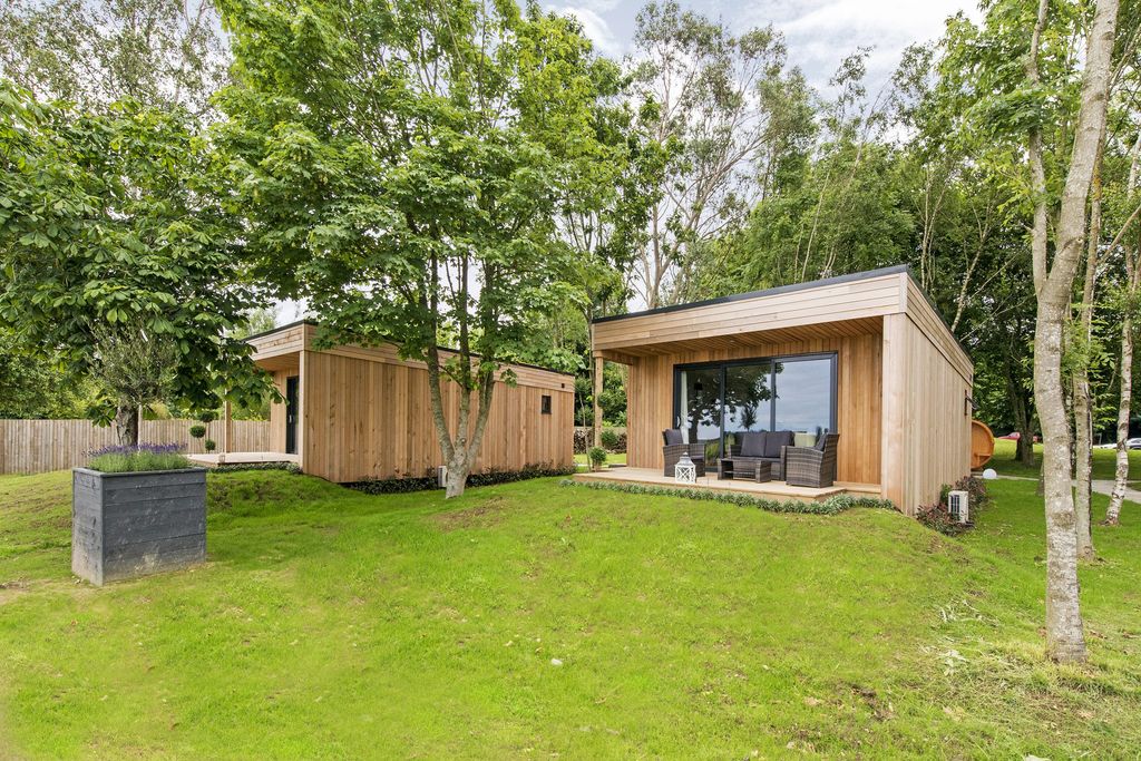 Image may contain Grass Plant Housing Building Yard Outdoors Nature House Cottage and Lawn