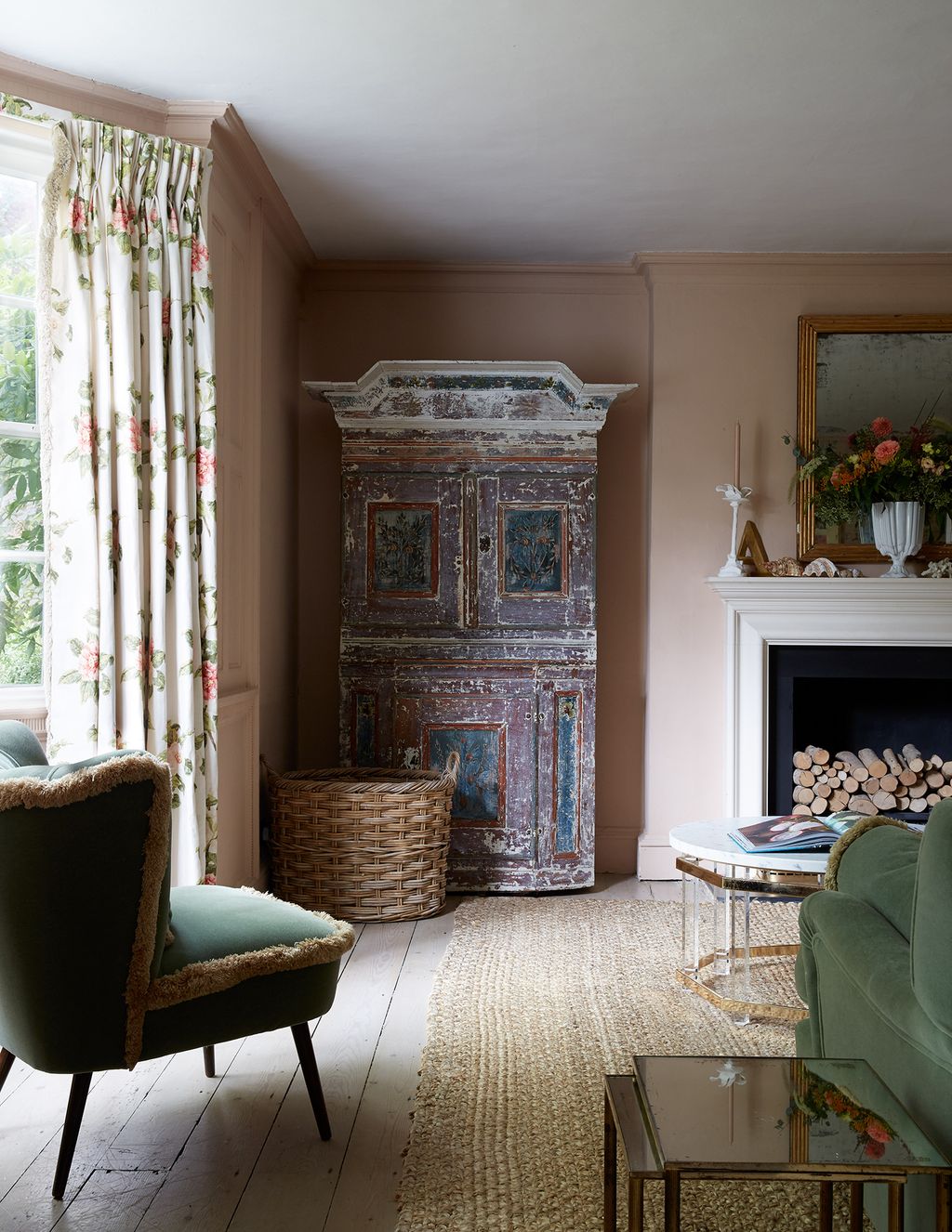 Image may contain Furniture Living Room Room Indoors Home Decor Interior Design Chair Couch Flooring and Hearth