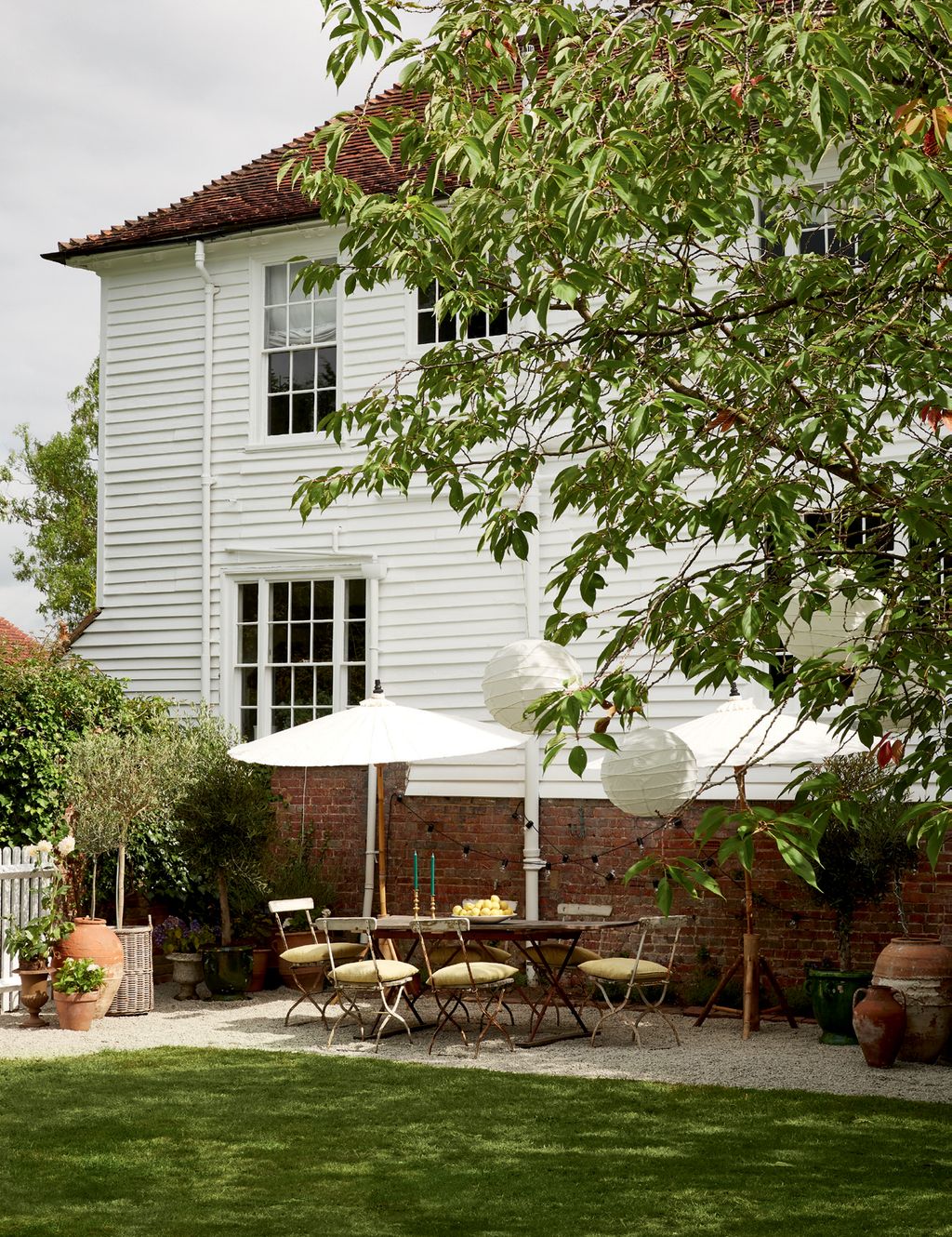 Image may contain Yard Outdoors Nature Patio Plant Backyard and Grass