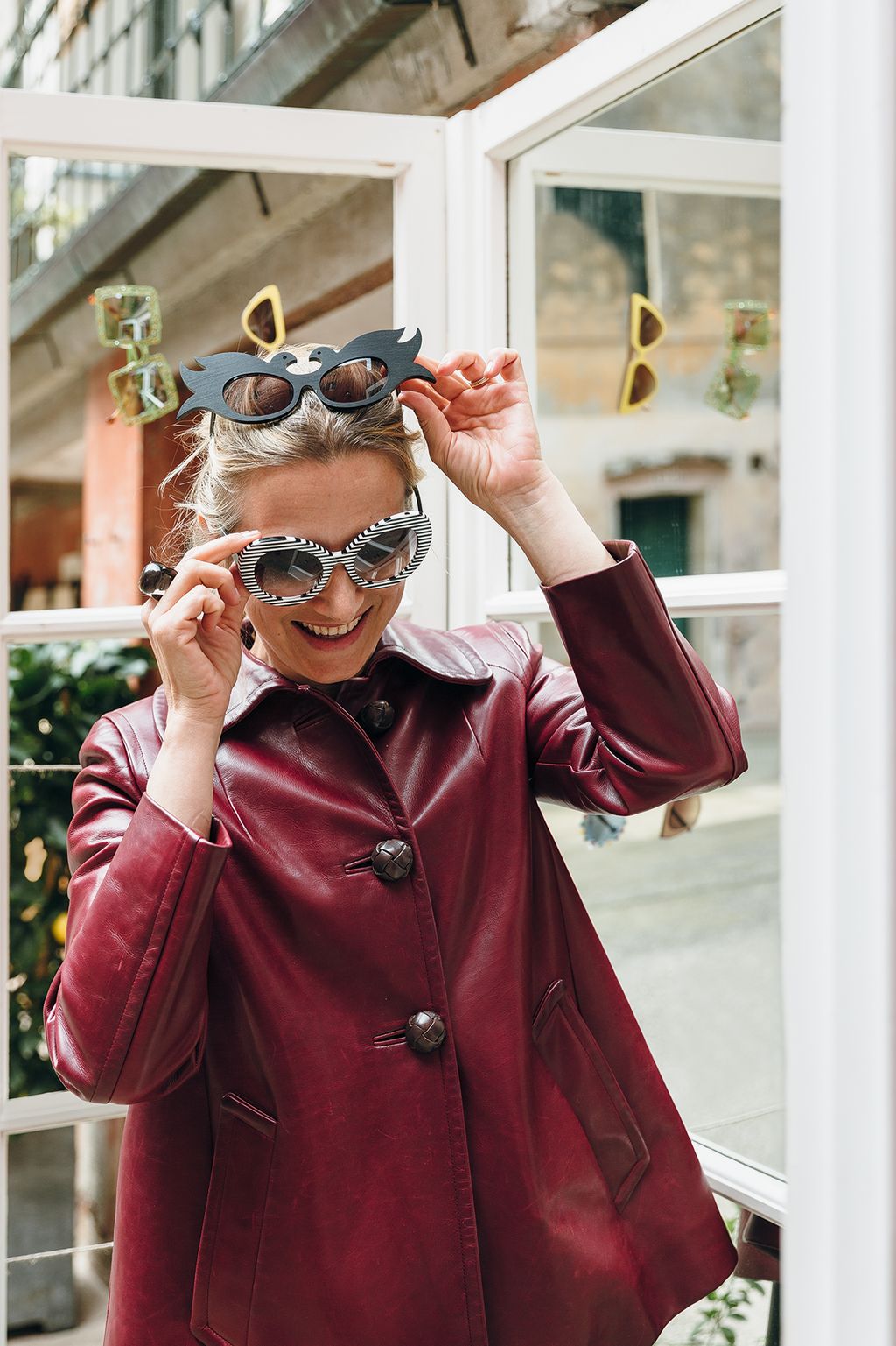 Image may contain Accessories Goggles Accessory Clothing Apparel Sunglasses Coat Human and Person