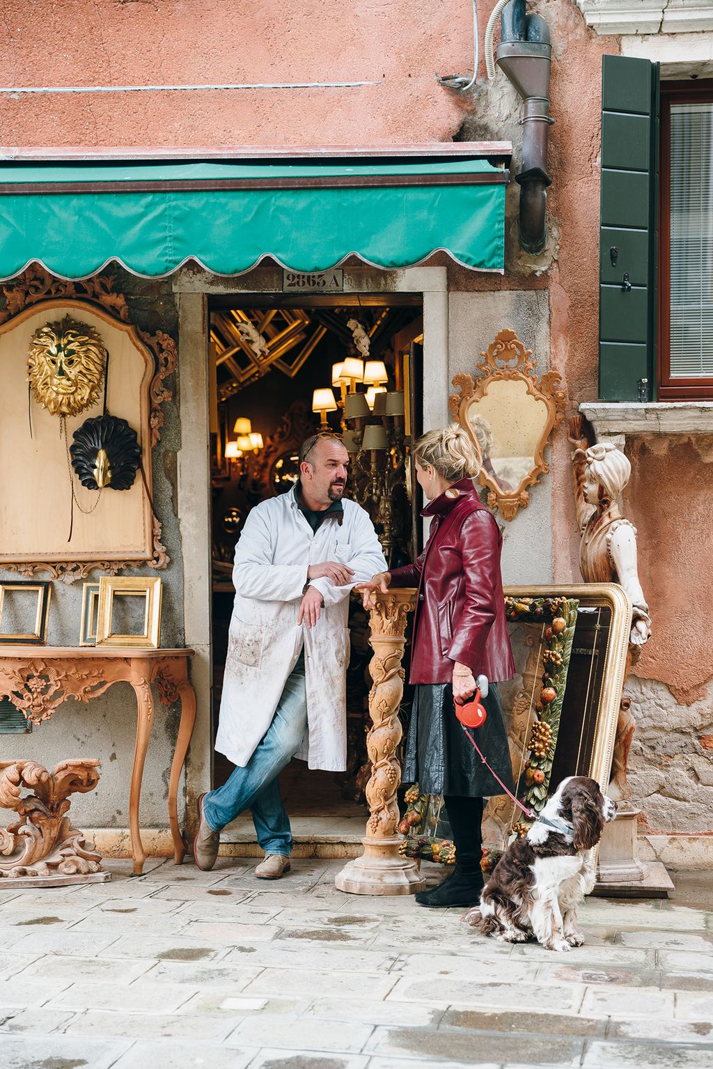 Image may contain Human Person Clothing Apparel Animal Dog Mammal Pet and Canine