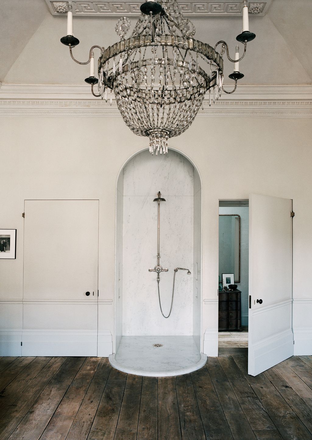 Image may contain Lamp Indoors Chandelier and Room