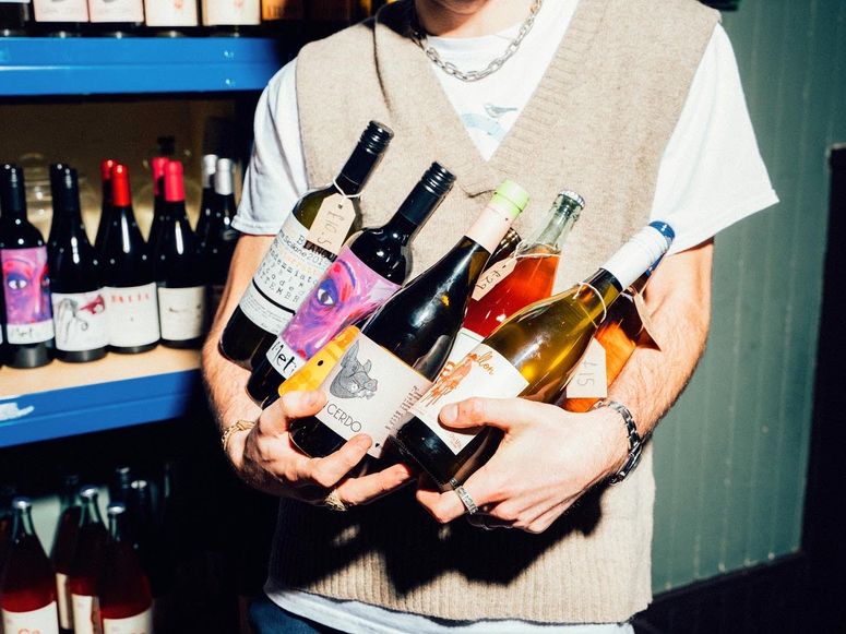 Image may contain: Human, Person, Bottle, Drink, Alcohol, Beverage, Beer, and Wine