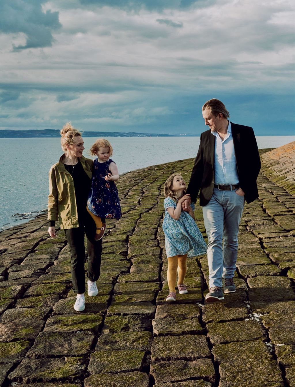 Image may contain Path Walkway Footwear Clothing Shoe Apparel Human Person Sidewalk Pavement Flagstone and Pants