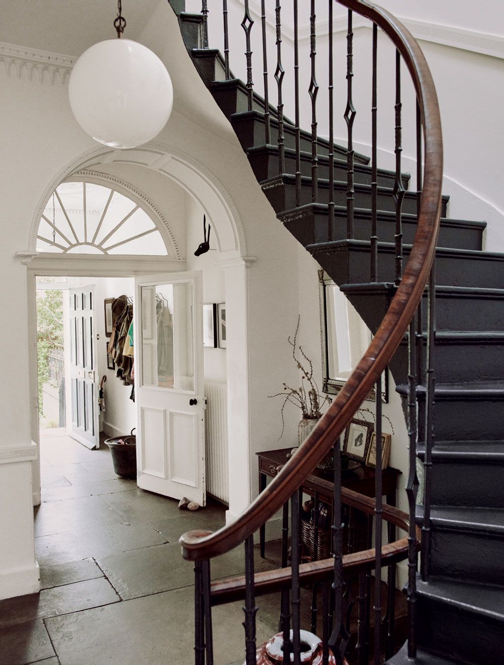 Image may contain Banister Handrail Staircase Floor and Flooring