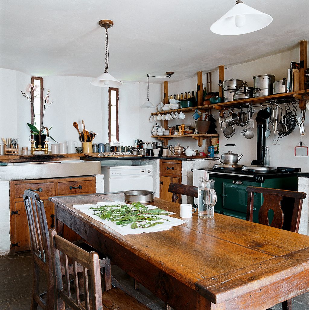 Image may contain Wood Hardwood Plywood Indoors Room Flooring Kitchen Island and Kitchen