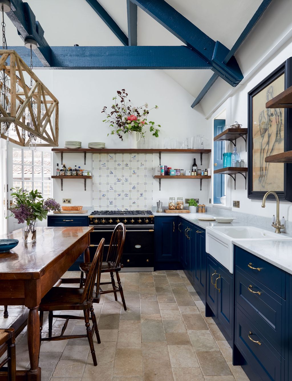 Image may contain Indoors Interior Design Furniture Chair Room Flooring Kitchen Housing Building and Plant