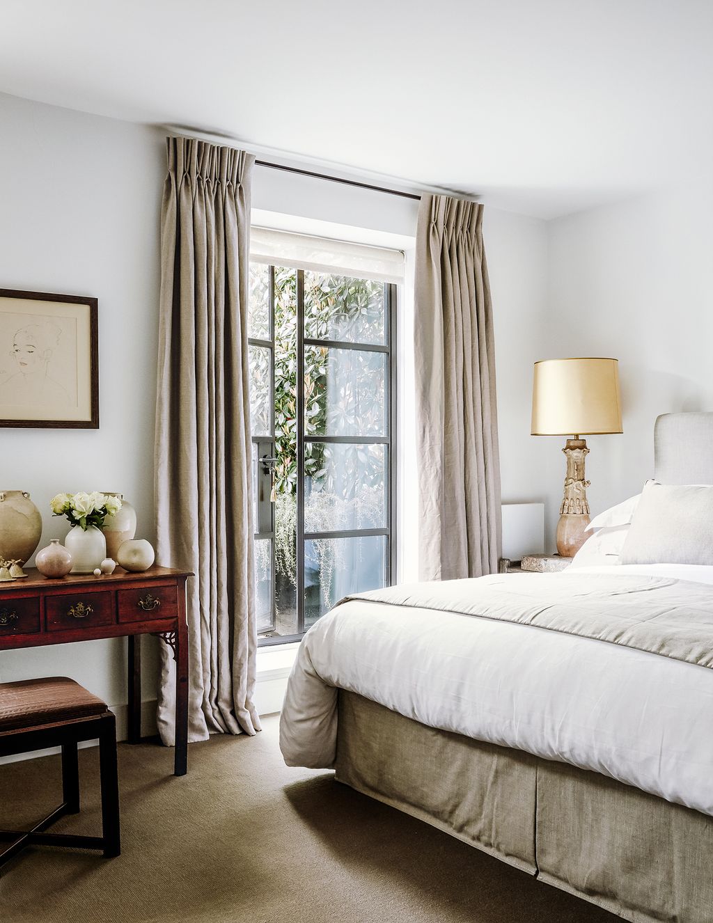 Image may contain Furniture Indoors Room Bedroom Bed Home Decor and Interior Design