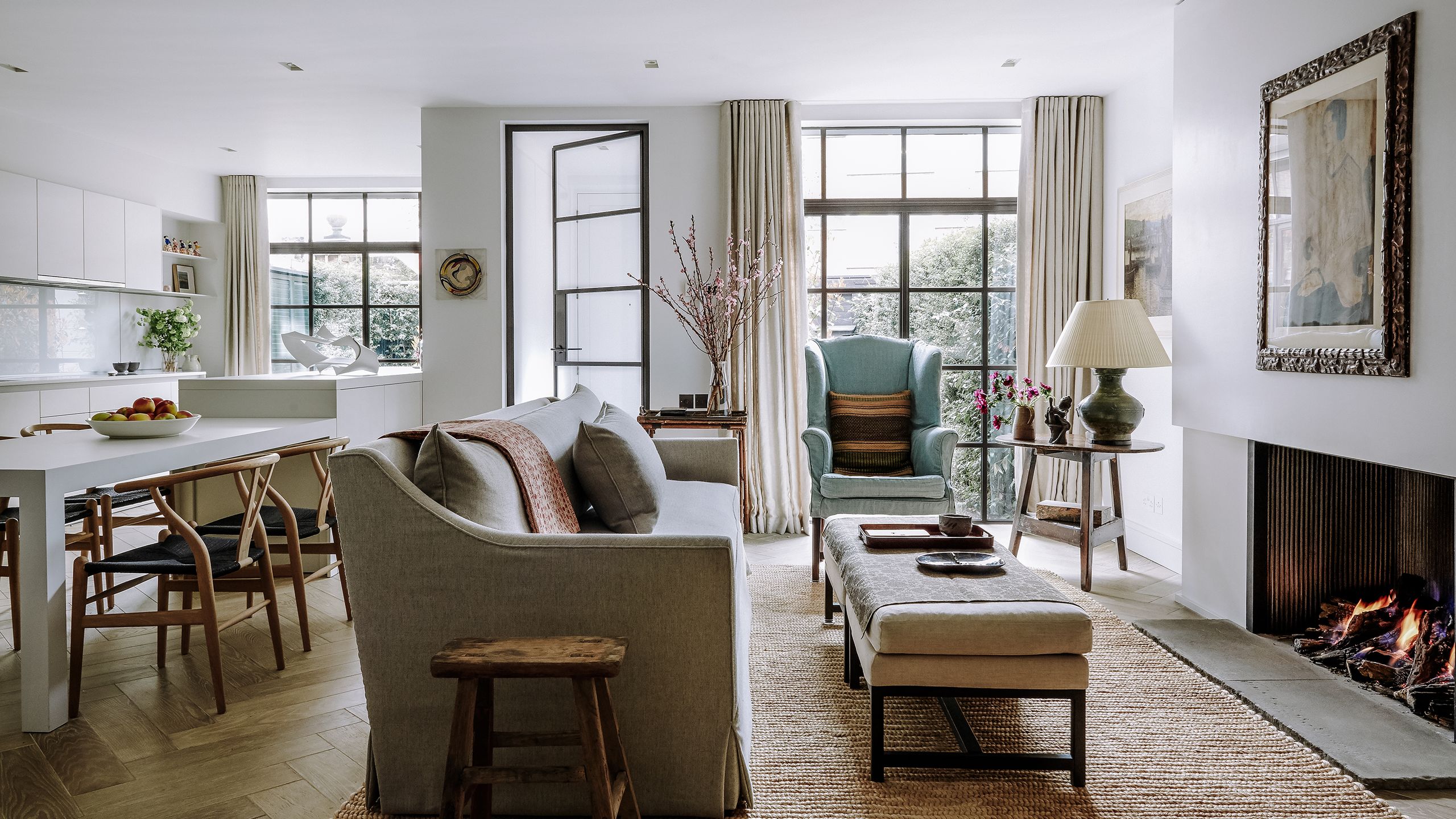 Image may contain Living Room Room Indoors Furniture Couch Interior Design Table Chair and Home Decor