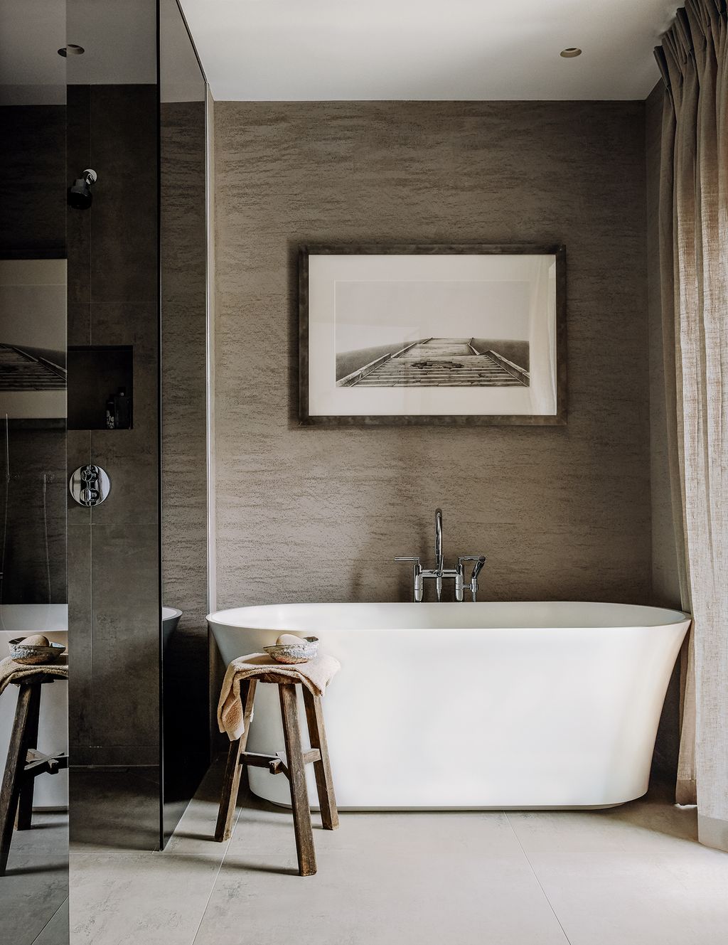 Image may contain Furniture Tub Bathtub Bar Stool Interior Design Indoors and Room