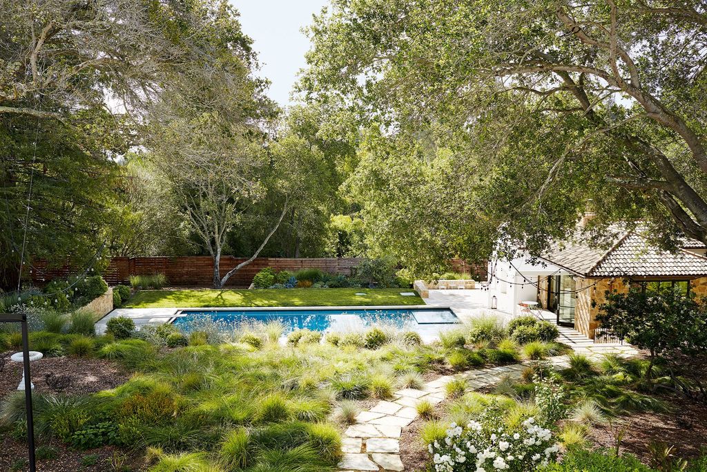 Image may contain Building Outdoors Nature Housing Cottage House Yard Water and Plant