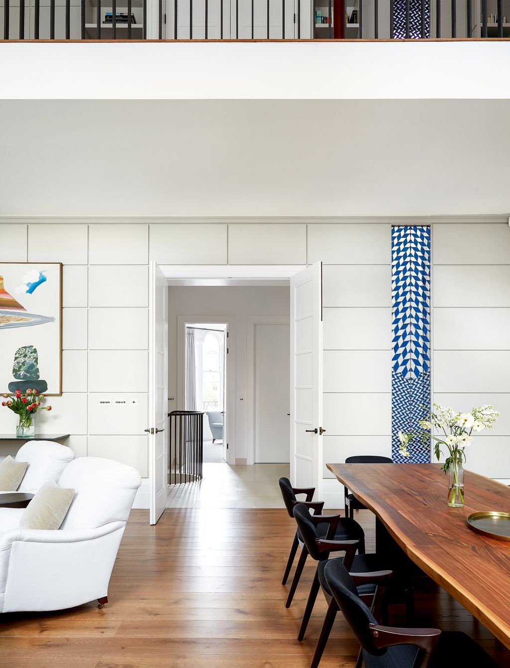 The wooden Silvera table at one end of the formal sitting room on the first floor is teamed with ‘Boyet...