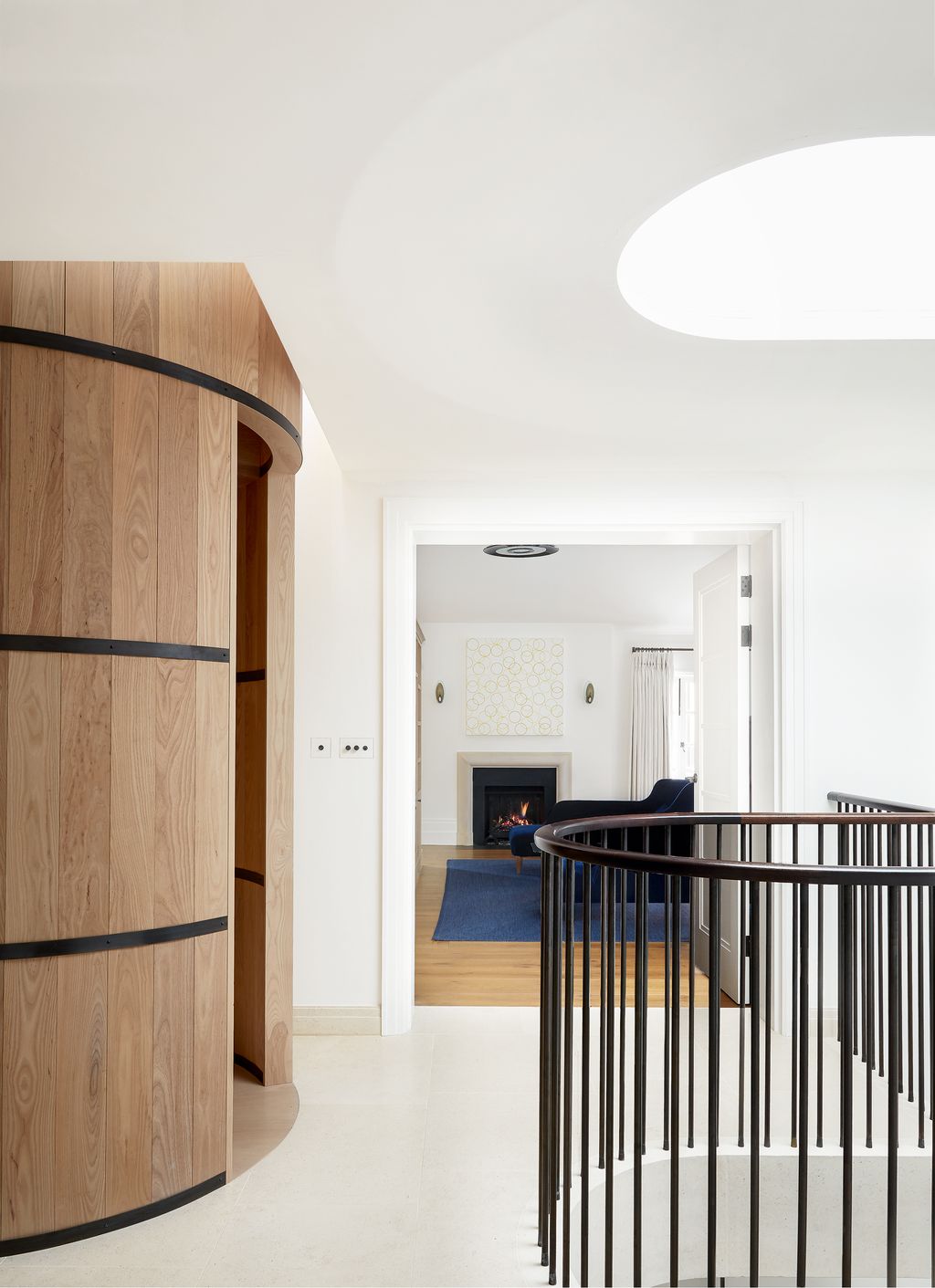 Image may contain Furniture Wood Railing Floor Interior Design Indoors Flooring Banister Handrail and Hardwood