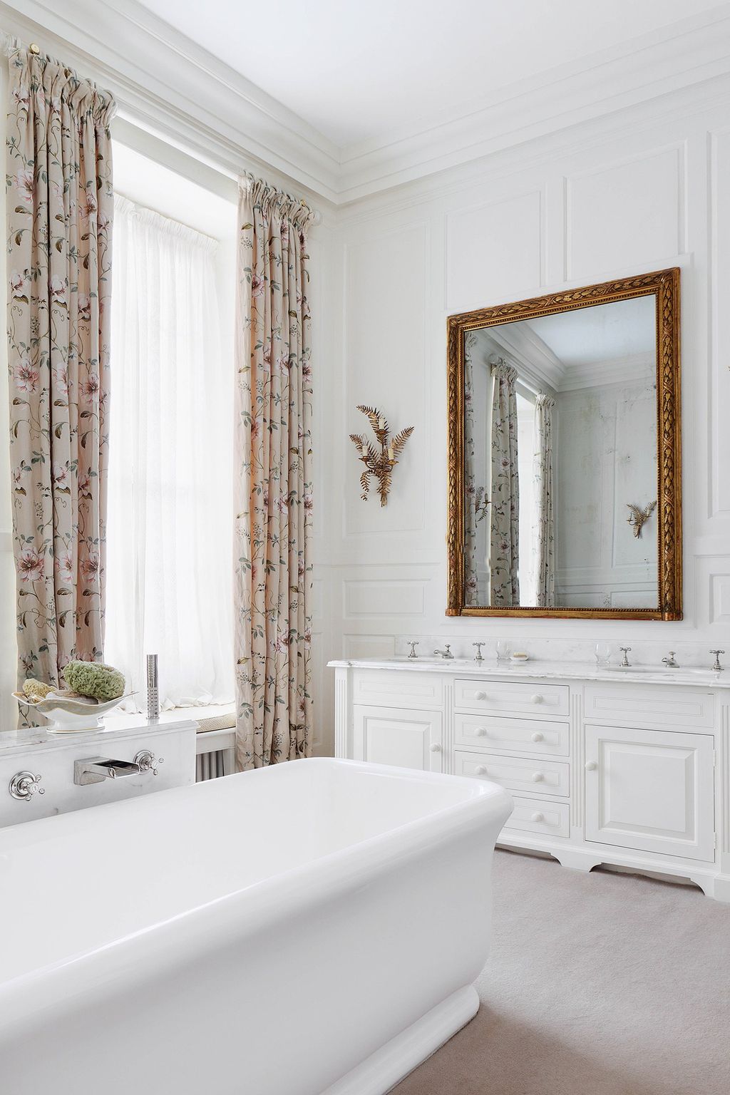 Image may contain Indoors Room Tub Bathtub Bathroom and Interior Design