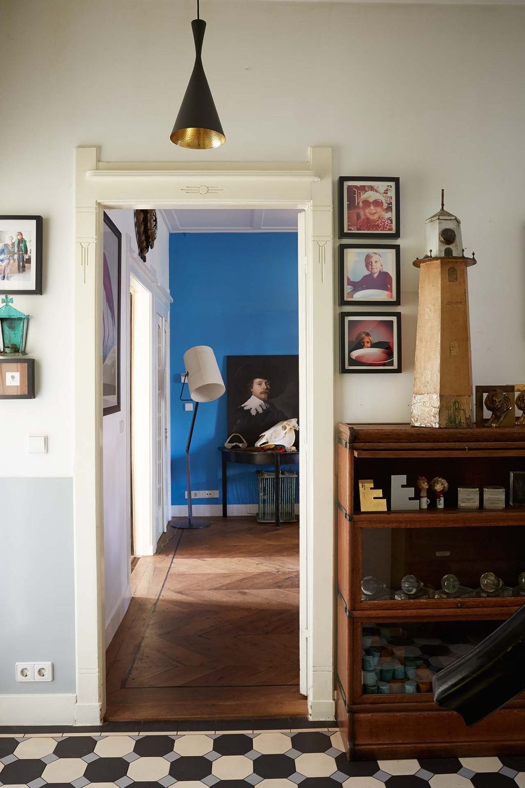 Image may contain Flooring Human Person Wood Shelf Floor Furniture Interior Design Indoors and Hardwood