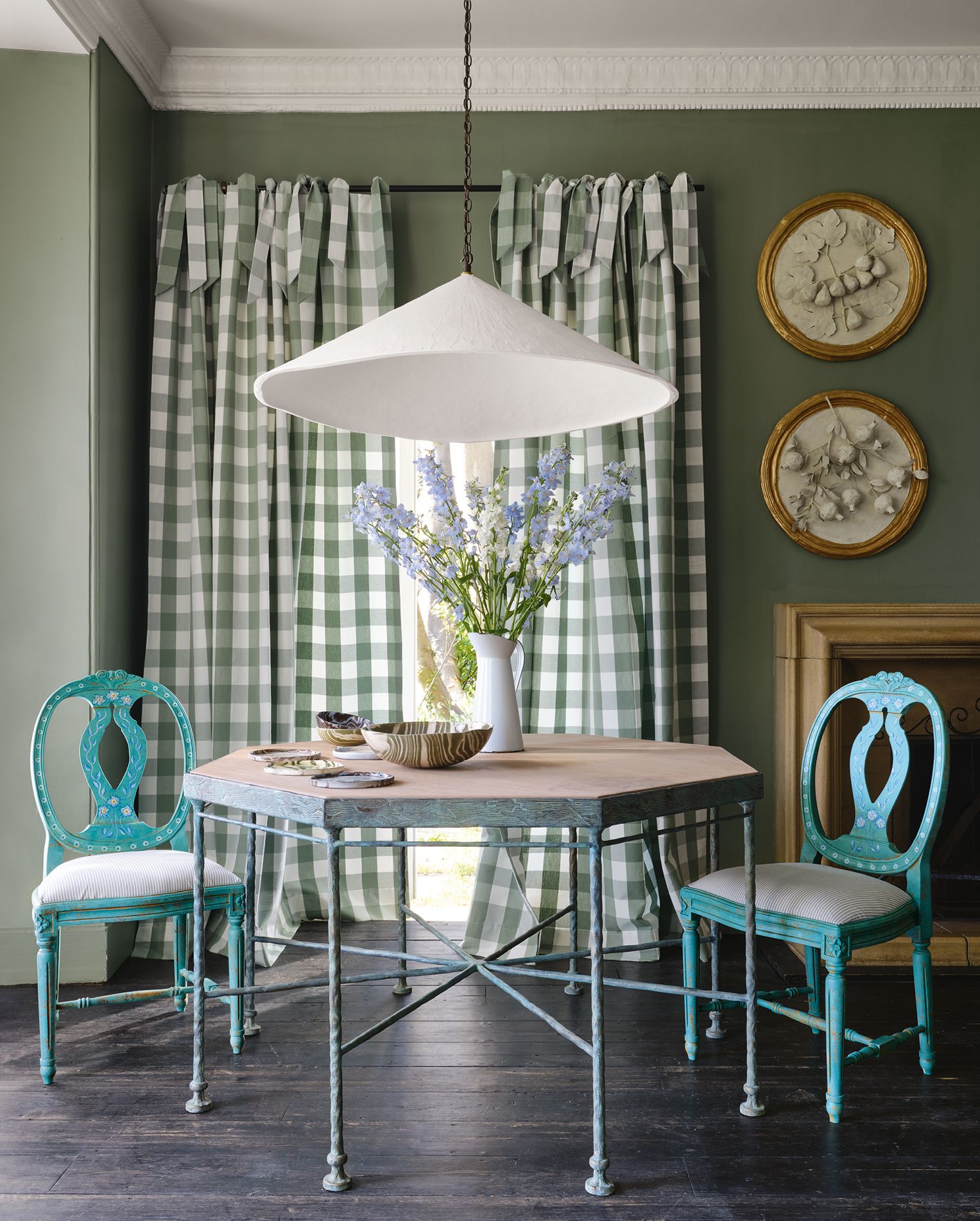 Image may contain Home Decor Furniture Chair Indoors Interior Design Table Room Flooring and Living Room