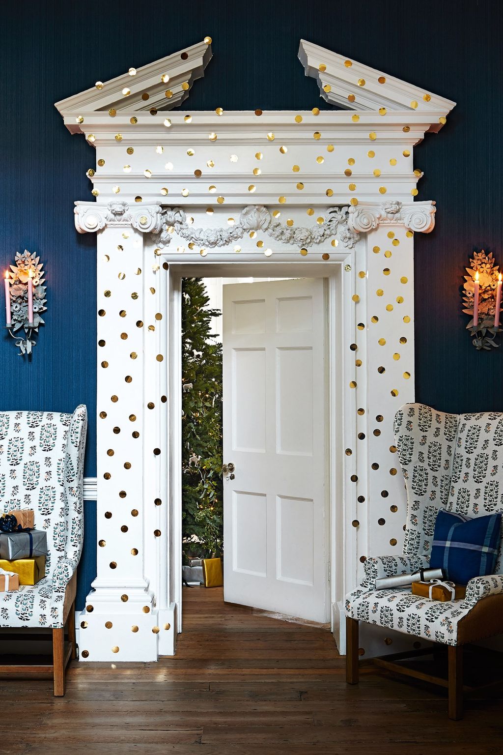 Gold dots are a fun and crucially very temporary way of adding a Christmas feel to the home. Gold dots cut from foil...