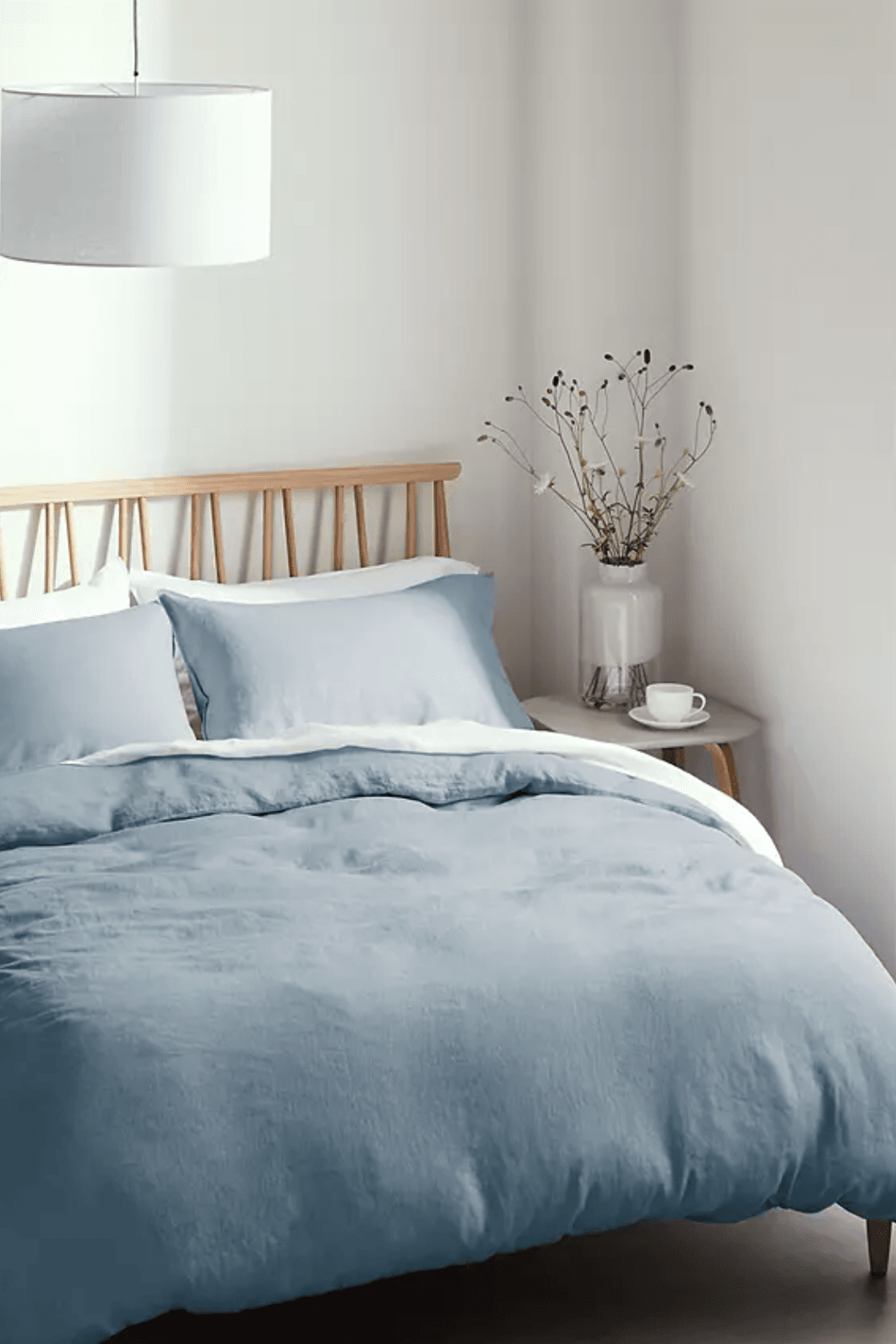 Image may contain Furniture Bed and Blanket