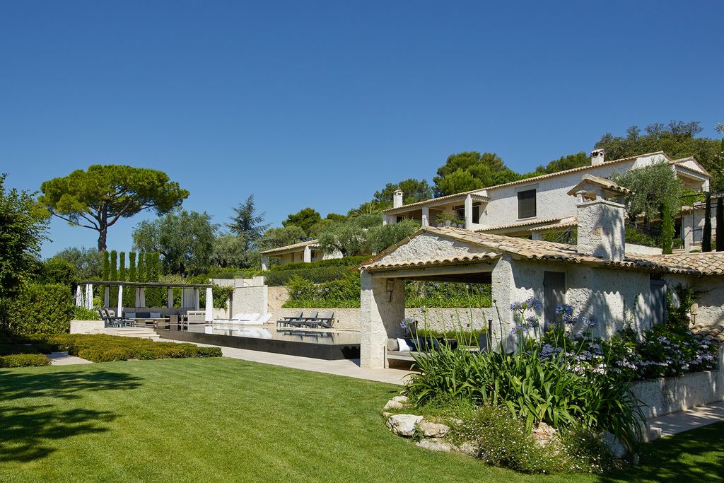 Image may contain Grass Plant Lawn Outdoors Housing and Building