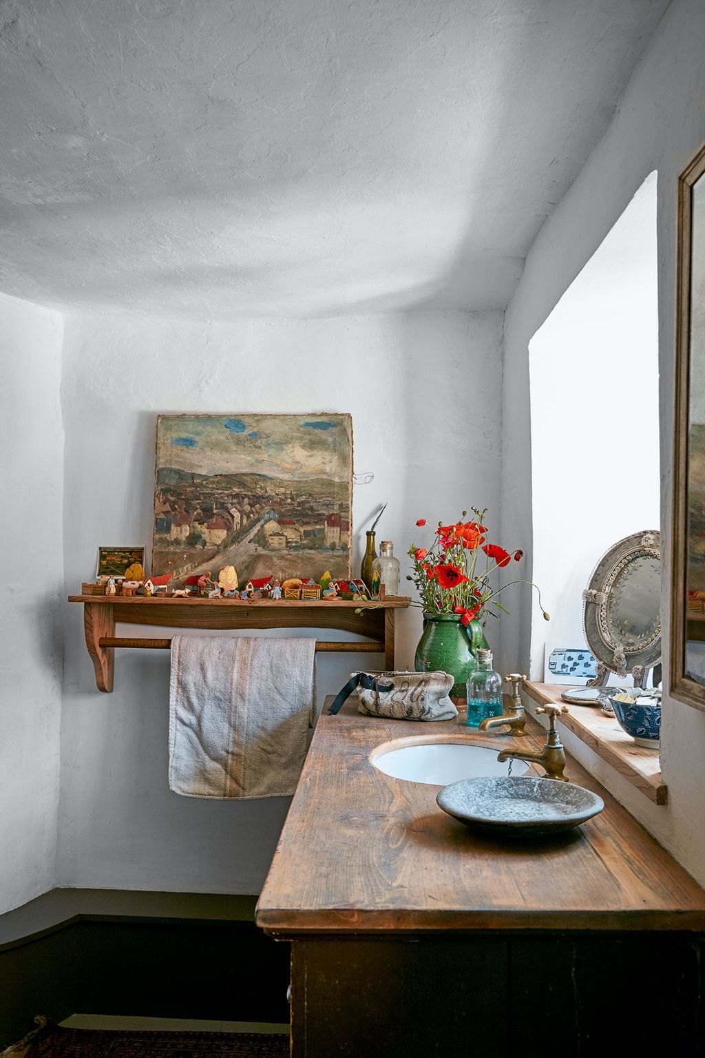 Image may contain Indoors Interior Design Wood Flooring Plant and Hardwood