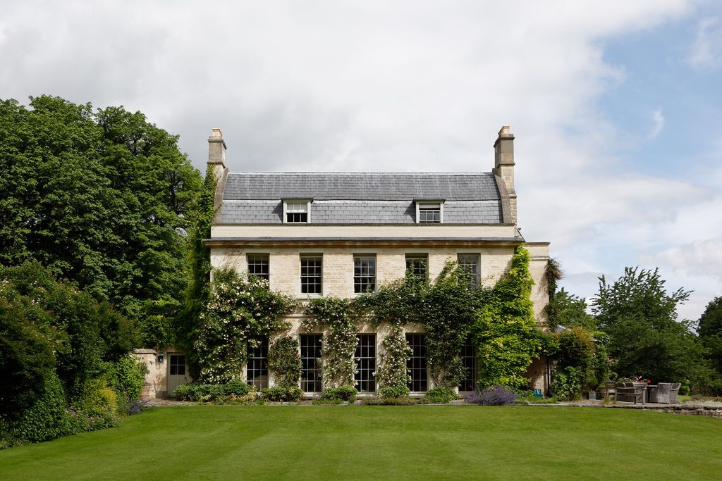 Image may contain Plant Grass Lawn Building and Housing