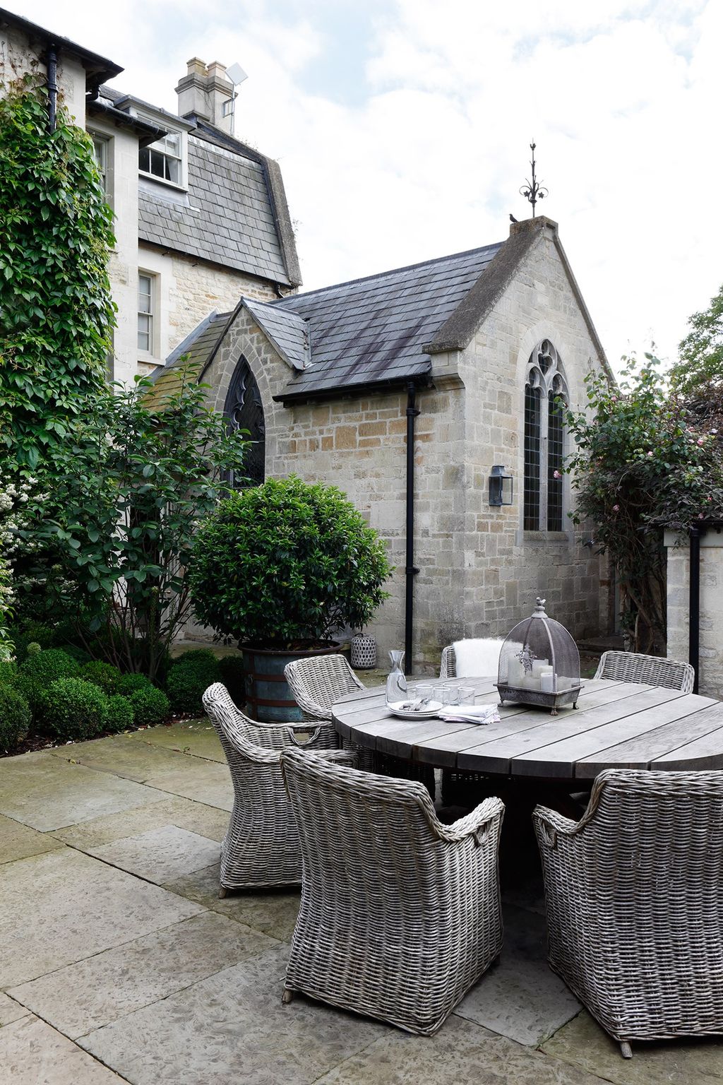 Image may contain Flagstone Patio Furniture and Chair