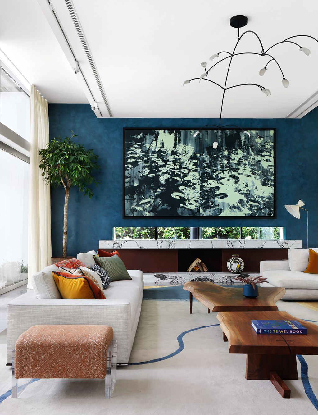 Image may contain Living Room Indoors Room Furniture Table Coffee Table Couch Building and Housing