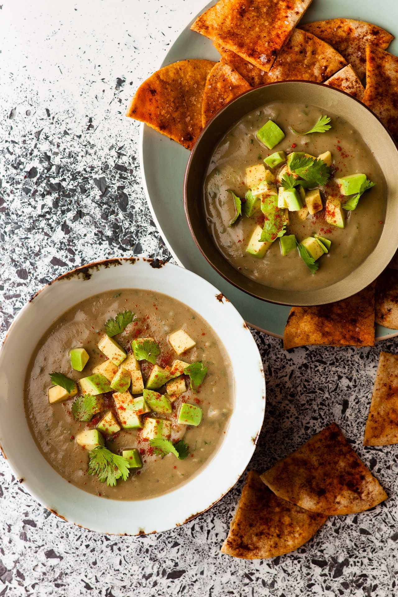 Image may contain Bowl Food Dish Meal Plant Pizza Soup Bowl and Curry