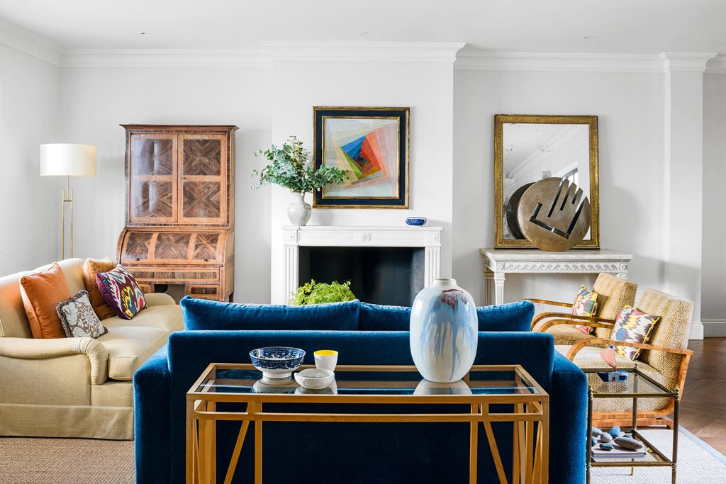 Image may contain Living Room Room Indoors Furniture Couch and Interior Design