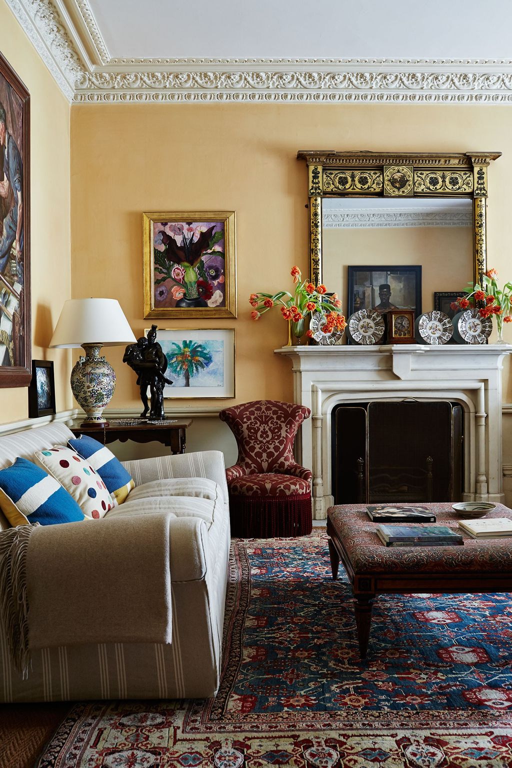 Image may contain Furniture Living Room Indoors Room Rug Lamp and Table Lamp