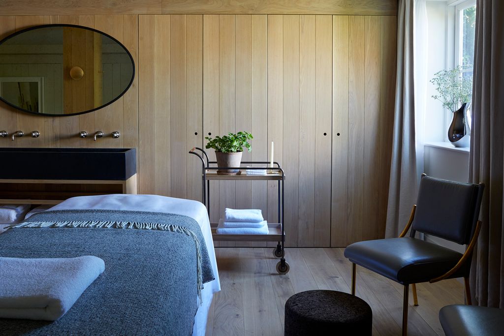 Image may contain Furniture Chair Interior Design Indoors Room Bedroom and Bed