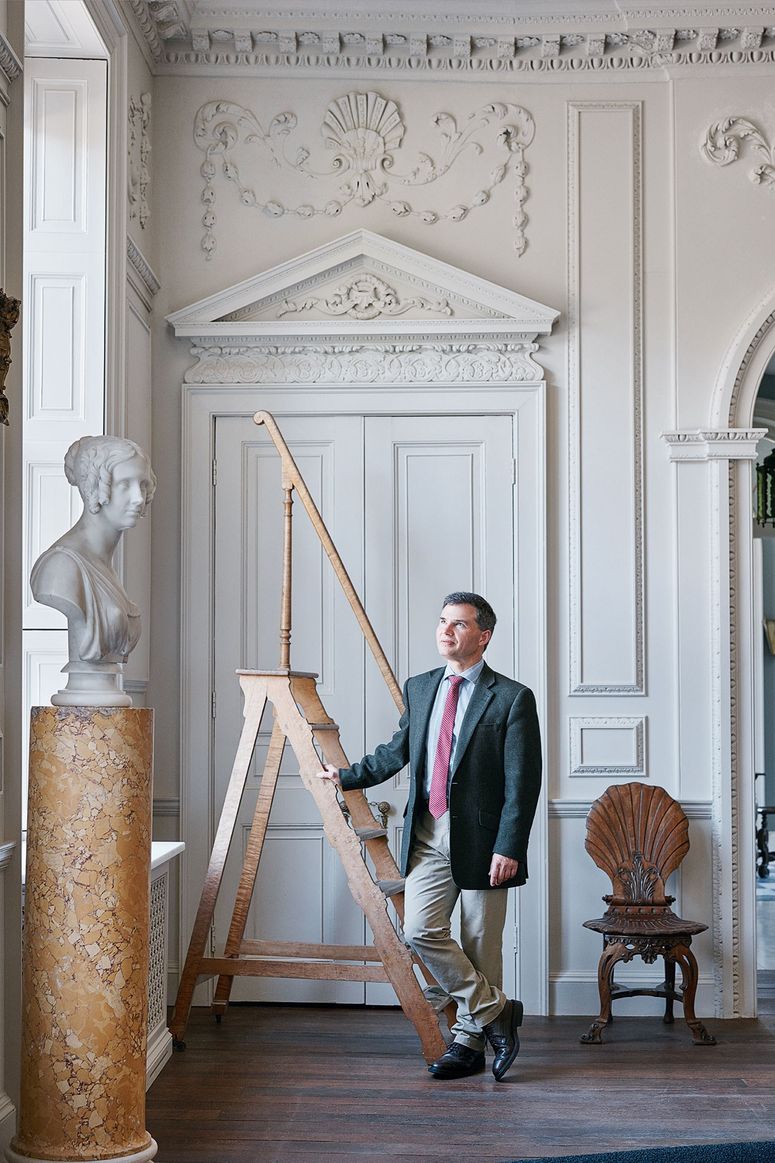 Image may contain: Banister, Handrail, Wood, Human, Person, Home Decor, Plywood, Clothing, Apparel, Art, Sculpture, and Floor