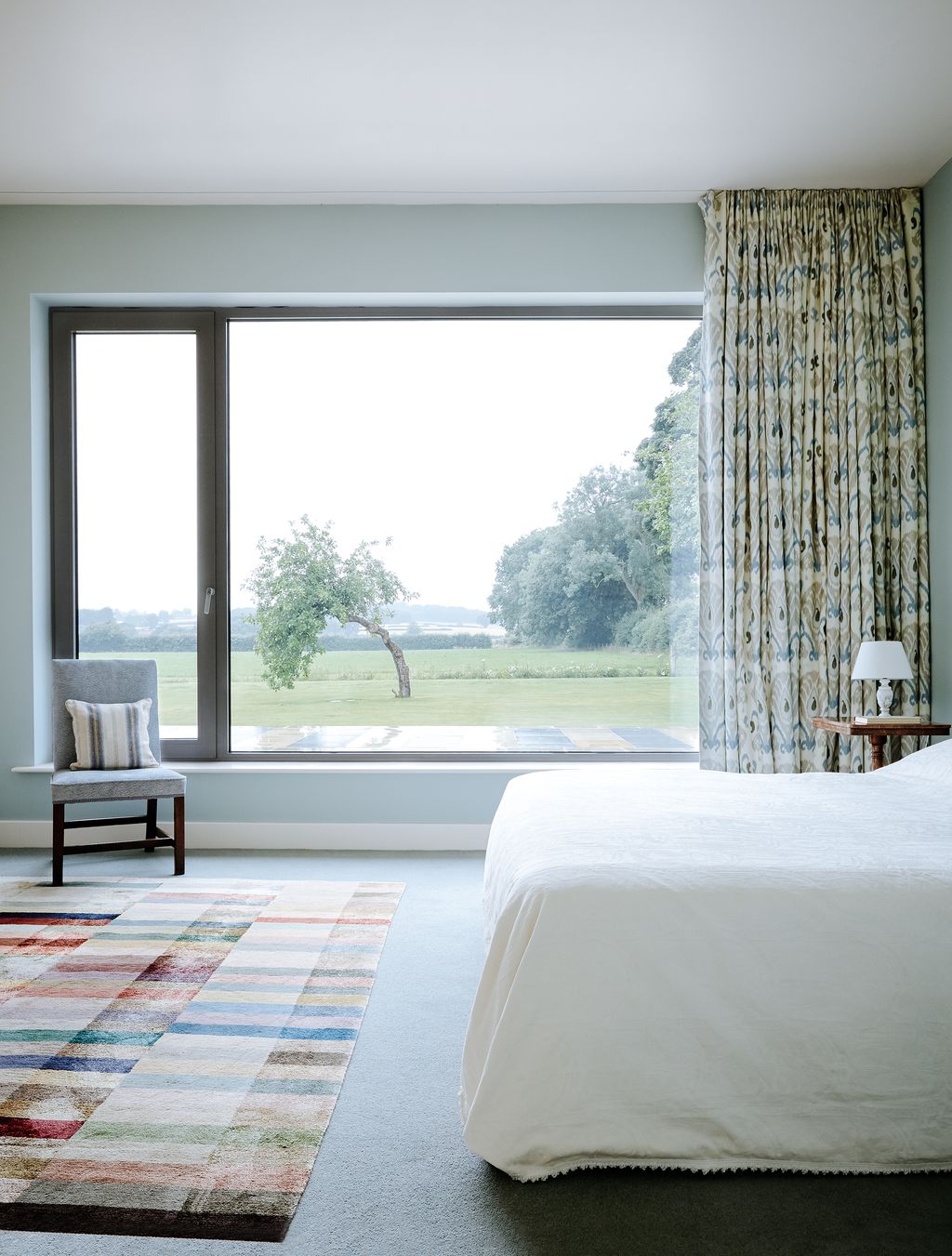 Image may contain Home Decor Rug Furniture and Bed