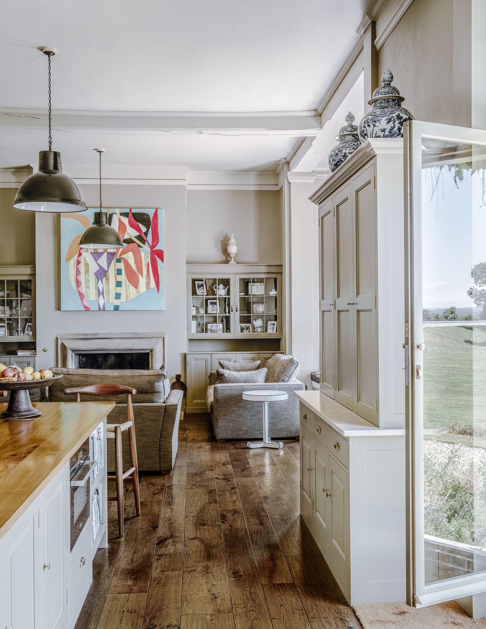 Image may contain Flooring Wood Interior Design Indoors Room Hardwood Furniture Living Room Floor and Shelf