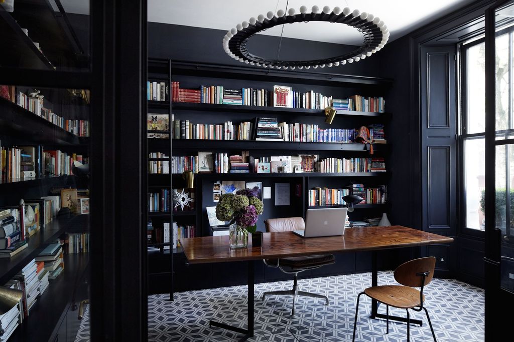 Image may contain Furniture Chair Bookcase Shelf Table Indoors and Room