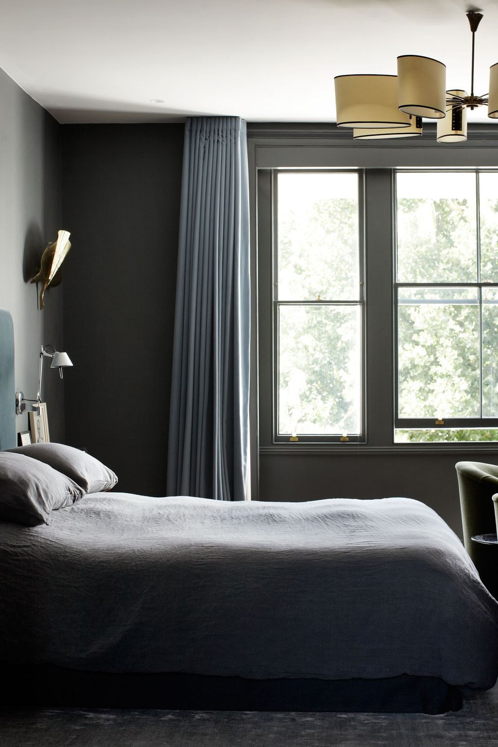 Image may contain Indoors Room Bedroom Furniture Bed and Dorm Room