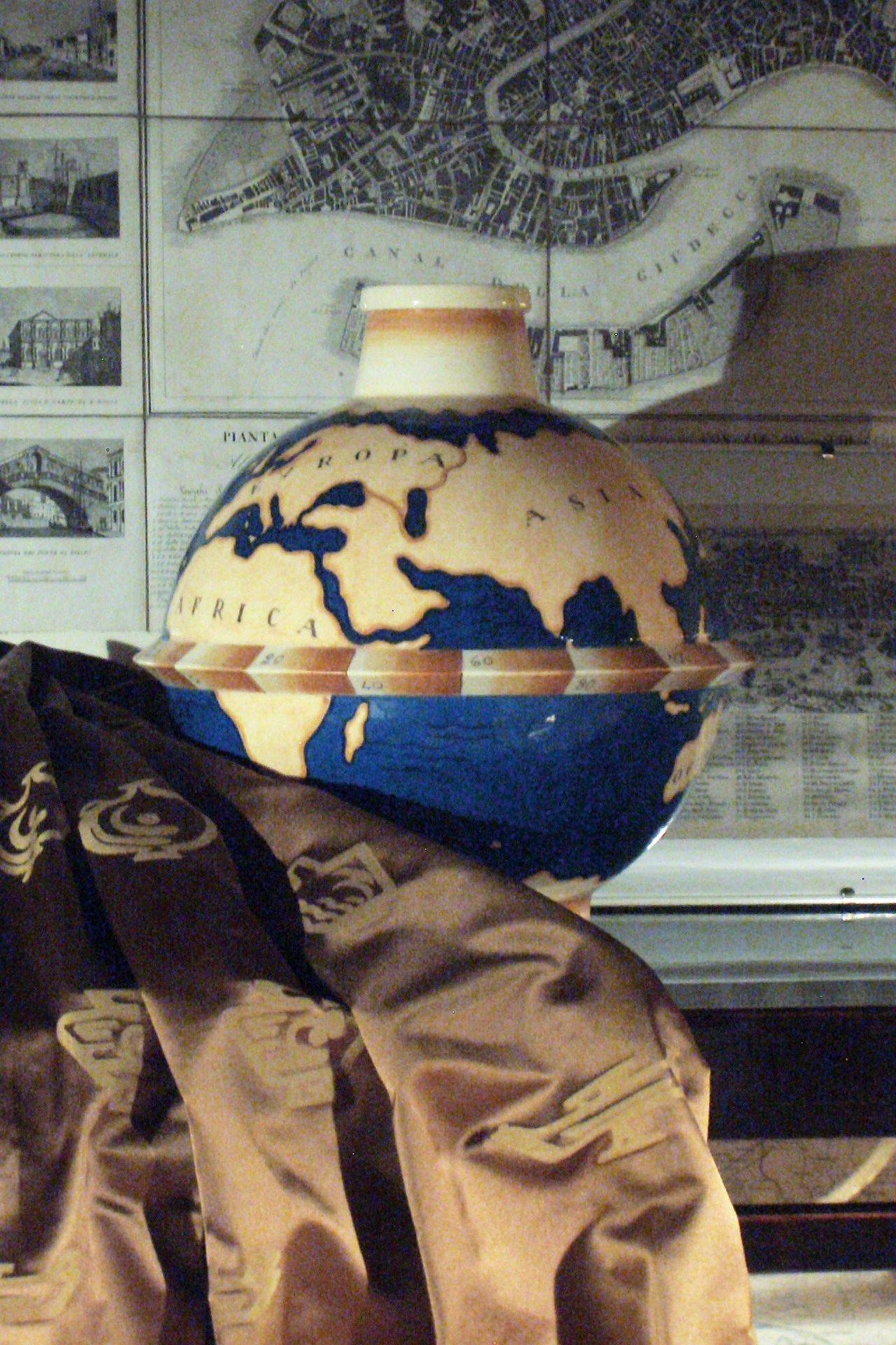 Image may contain Helmet Clothing Apparel Pottery Human Person Porcelain Art and Jar