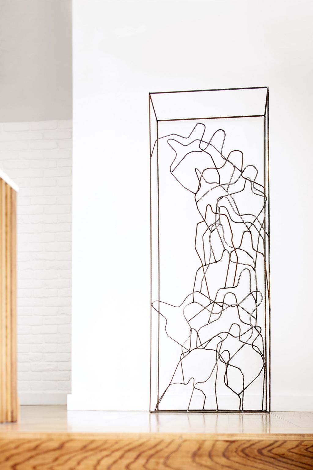 A sculpture by Carlo D'oria is displayed on the firstfloor landing.