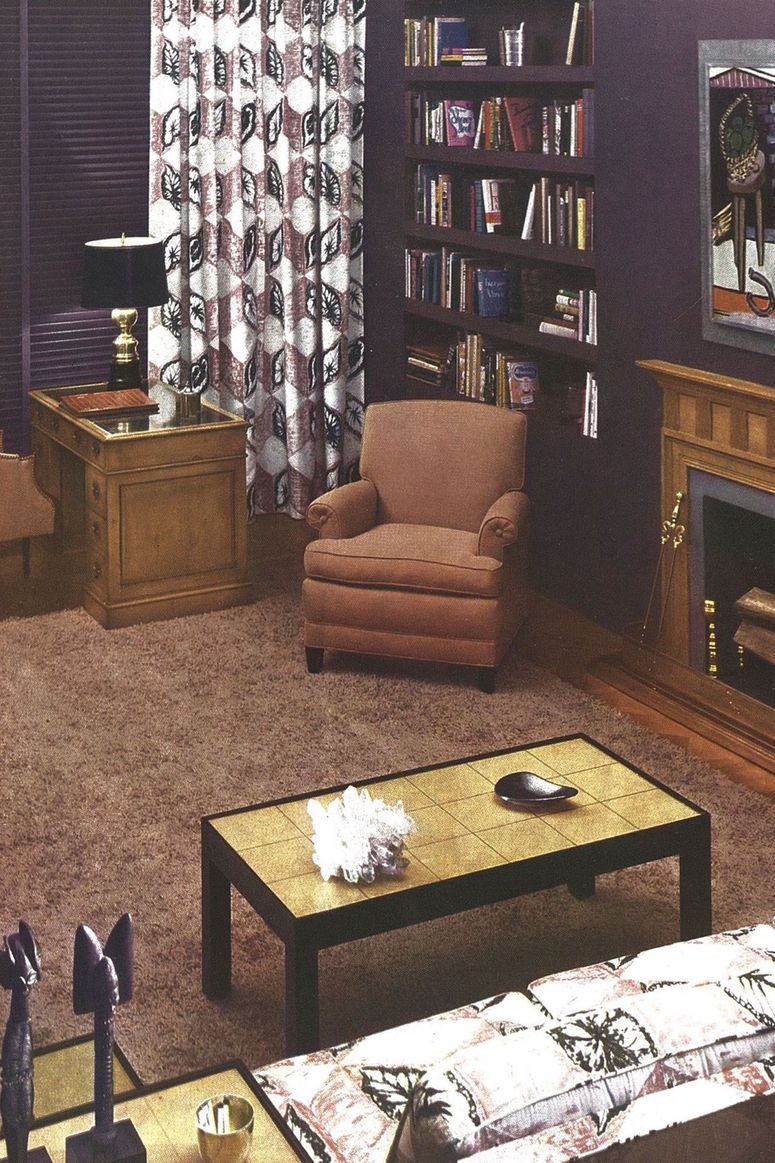 Image may contain: Furniture, Table, Living Room, Room, Indoors, Coffee Table, Rug, and Bookcase