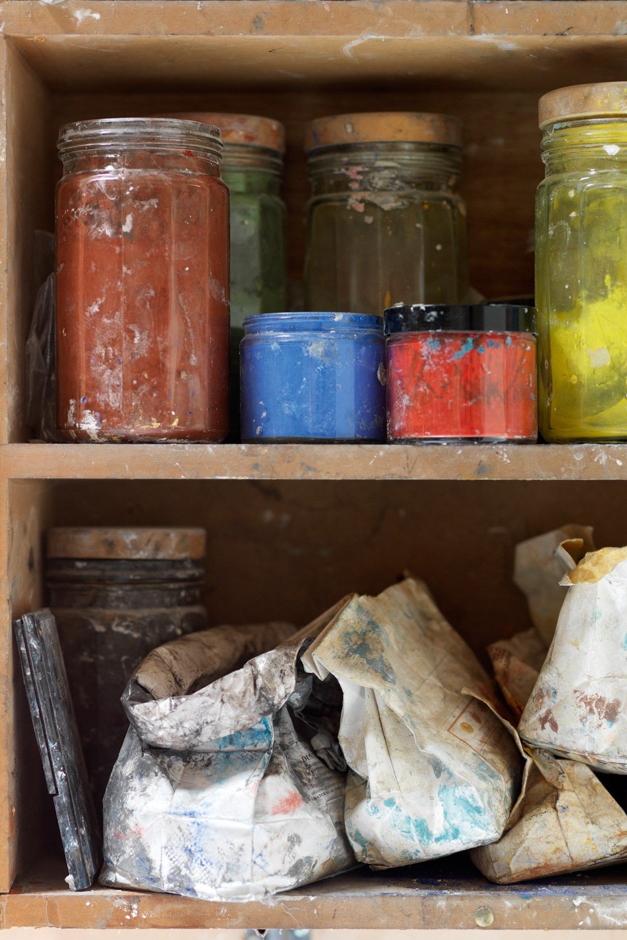 Image may contain Shelf Furniture Cupboard Closet Jar Food Dessert Ice Cream Creme and Cream