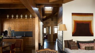 Image may contain Wood Flooring Living Room Room Indoors Hardwood Floor Furniture Couch Chair and Interior Design