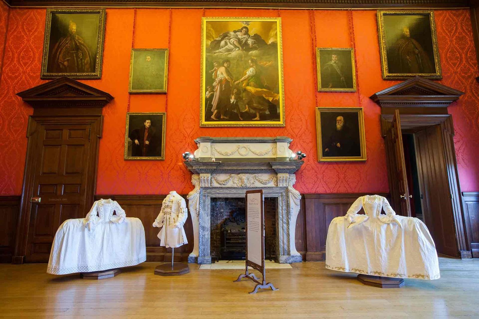 Image may contain Flooring Floor Wood Hardwood Interior Design Indoors Living Room Room and Fireplace