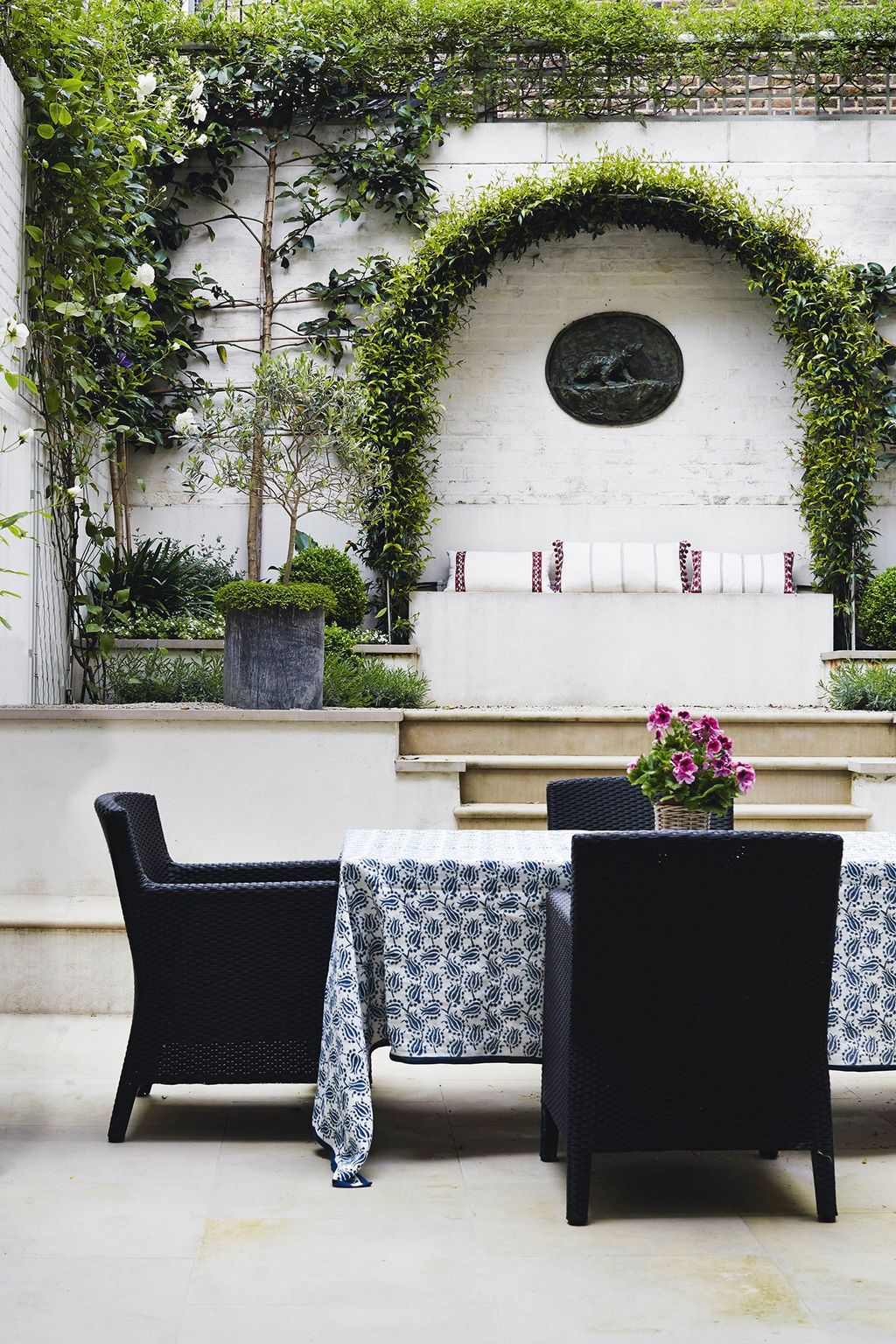 Image may contain Plant Furniture Chair Couch Flower Blossom and Flower Arrangement