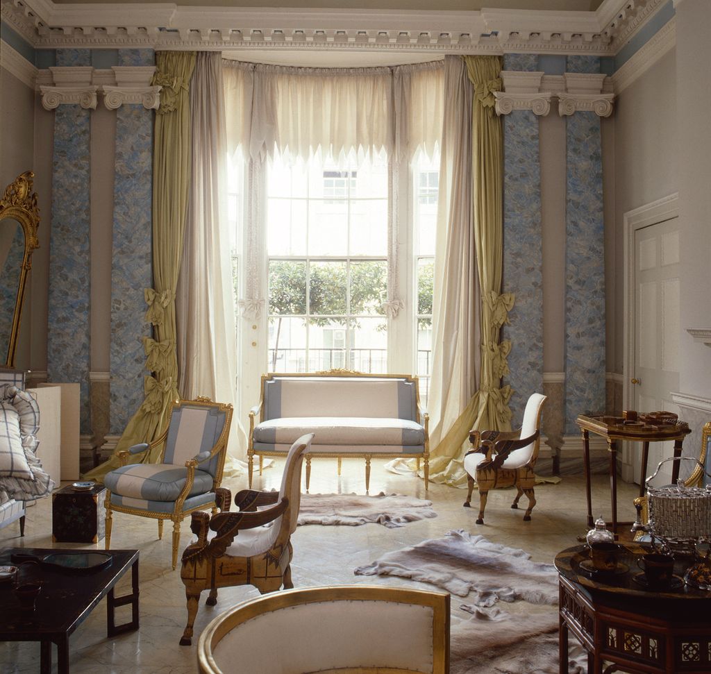 Drawing Room. An English room with French and Russian influence. Note the silk curtains falling and spreading generously...