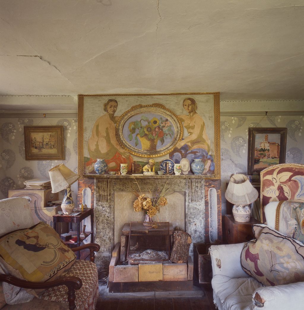 Image may contain Living Room Room Indoors Furniture Home Decor Interior Design Couch Cushion and Pillow